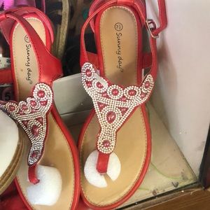 brand new red sandals